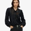 Blusa de manga larga con encaje tejido