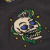 Camiseta ajustada con strass y pequeño tatuaje