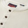 Camiseta de manga larga con medio botonado y tejido de rizo