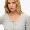 Camiseta deportiva de manga larga con botones