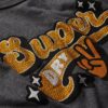 Camiseta sin mangas ajustada con adornos retro