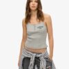 Camiseta sin mangas con botones bordados de Athletic Essentials