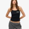 Camiseta sin mangas con botones bordados de Athletic Essentials