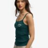 Camiseta sin mangas con botones bordados de Athletic Essentials