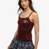 Camiseta sin mangas con botones bordados de Athletic Essentials