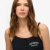 Camiseta sin mangas con botones bordados de Athletic Essentials