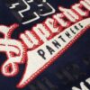 Chaqueta bomber con parches universitarios