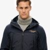 Chaqueta híbrida con capucha Trekker