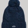 Gorro de punto trenzado con pompón