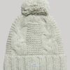 Gorro de punto trenzado con pompón