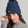 Gorro de punto trenzado con pompón