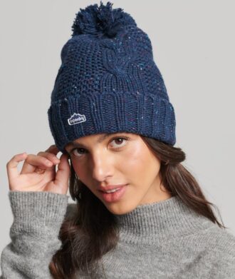 Gorro de punto trenzado con pompón