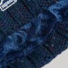 Gorro de punto trenzado con pompón