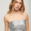 Minivestido con tirantes y flecos