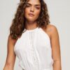Mono con cuello halter corto
