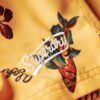 Pantalones cortos de 43 cm con estampado hawaiano reciclado