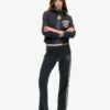Pantalones jogger acampanados con rayas de Athletic Essentials