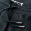 Pantalones jogger acampanados con rayas de Athletic Essentials