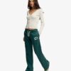 Pantalones jogger acampanados de talle bajo Athletic Essentials