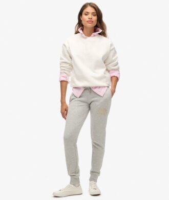 Pantalones jogger ajustados con logotipo metálico de lujo