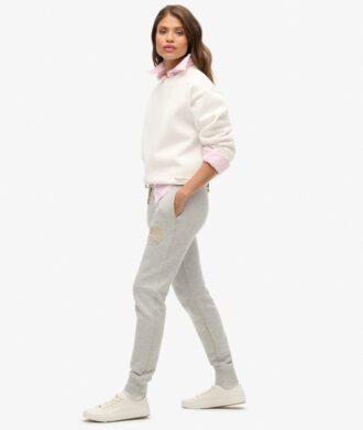 Pantalones jogger ajustados con logotipo metálico de lujo