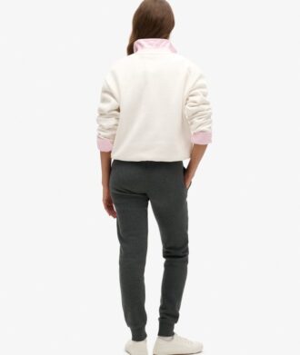Pantalones jogger ajustados con logotipo metálico de lujo