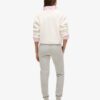 Pantalones jogger ajustados con logotipo metálico de lujo