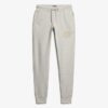 Pantalones jogger ajustados con logotipo metálico de lujo