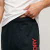 Pantalones jogger cónicos con logotipo deportivo