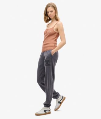Pantalones jogger con estampado gráfico y lavado Vintage de Athletic Essentials