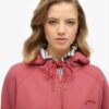 Sudadera con capucha, cremallera y mangas raglán oversize con el logotipo Essential