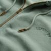 Sudadera con capucha, cremallera y mangas raglán oversize con el logotipo Essential