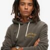 Sudadera con capucha holgada y gráfico de tatuaje en la espalda