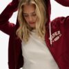 Sudadera con capucha y cremallera corta y holgada Athletic Essentials
