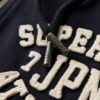 Sudadera con capucha y cremallera corta y holgada Athletic Essentials