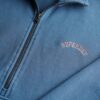 Sudadera con media cremallera y logotipo Essential