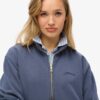 Sudadera oversize con media cremallera y logotipo Essential