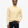 The Merchant Store – Jersey de cuello alto con trenzado