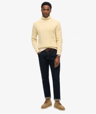 The Merchant Store – Jersey de cuello alto con trenzado