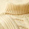 The Merchant Store – Jersey de cuello alto con trenzado