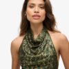 Top con cuello halter y volantes de lentejuelas