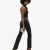 Top con cuello halter y volantes de lentejuelas