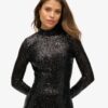 Vestido midi con lentejuelas y espalda descubierta