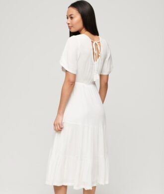 Vestido midi con volantes bordado