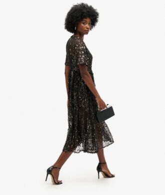 Vestido midi de malla con volantes