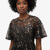 Vestido midi de malla con volantes