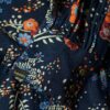Vestido midi de manga larga con volantes