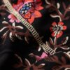 Vestido mini de té con cuello en V estampado
