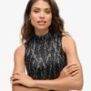 Vestido mini sin mangas con lentejuelas y corte en A